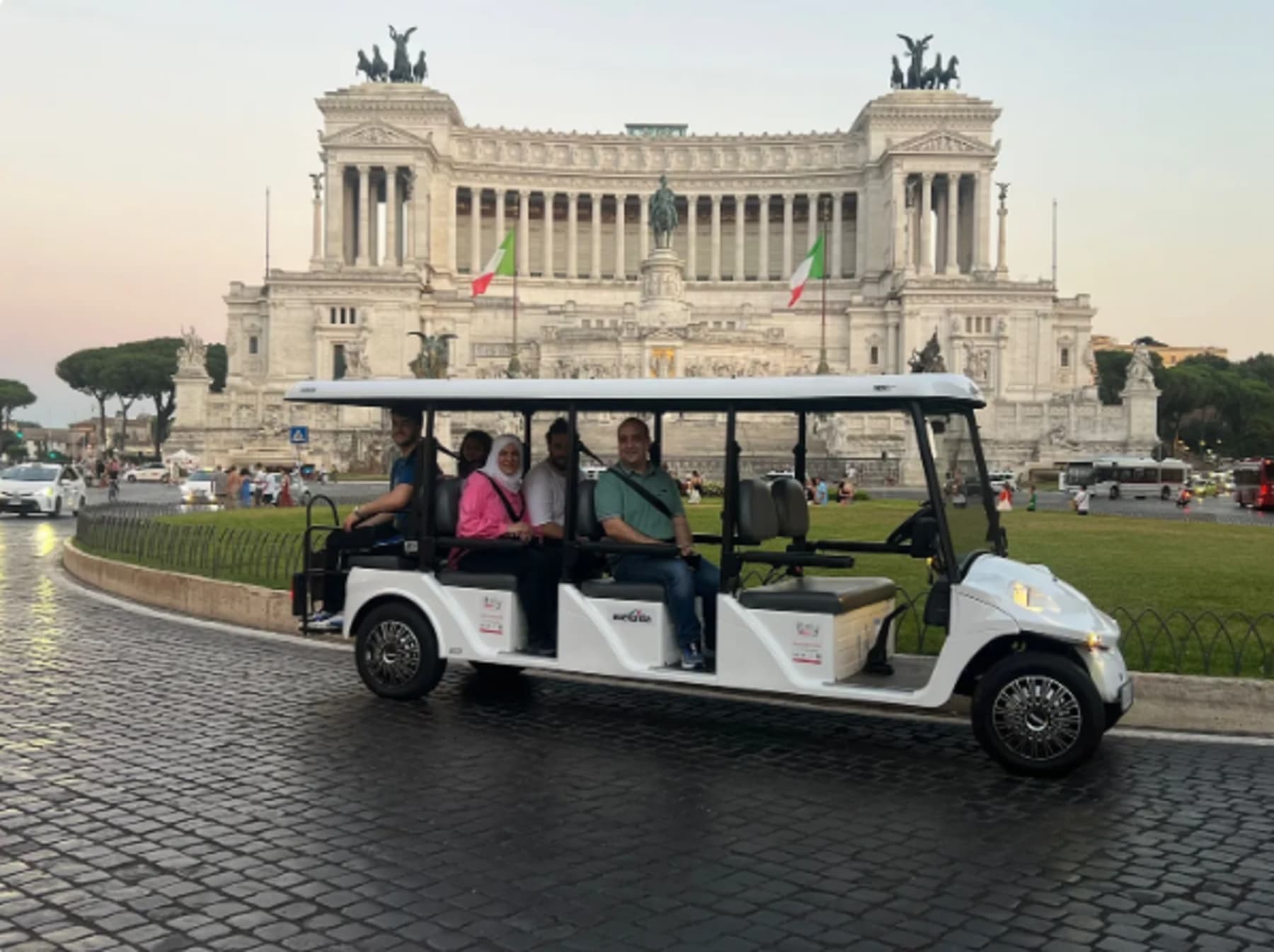 Evening light over Rome during a private golf cart tour
